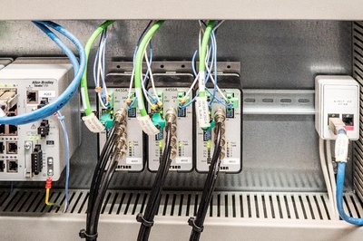 Eilersen load controllers with EtherNet IP interface in control cabinet.